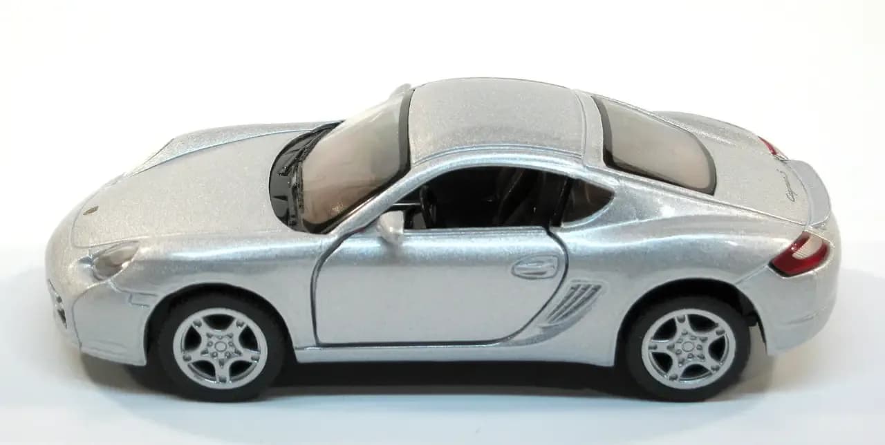 Машина Kinsmart Porsche Cayman S 1:34 KT5307W фото 2 Машина Kinsmart Porsche Cayman S 1:34 KT5307W фото 2