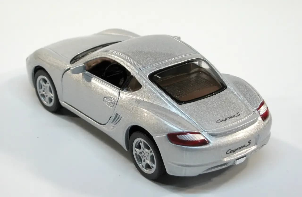 Машина Kinsmart Porsche Cayman S 1:34 KT5307W фото 4 Машина Kinsmart Porsche Cayman S 1:34 KT5307W фото 4