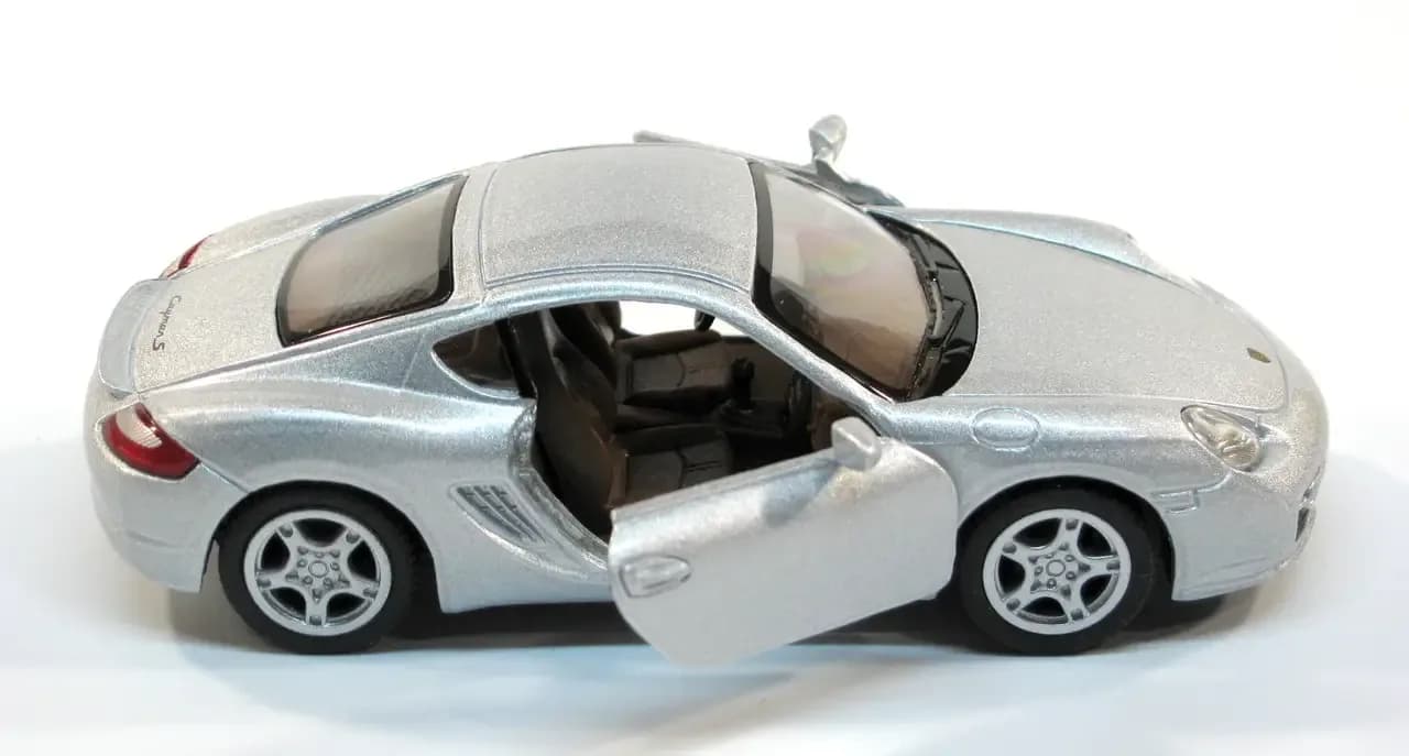 Машина Kinsmart Porsche Cayman S 1:34 KT5307W фото 7 Машина Kinsmart Porsche Cayman S 1:34 KT5307W фото 7