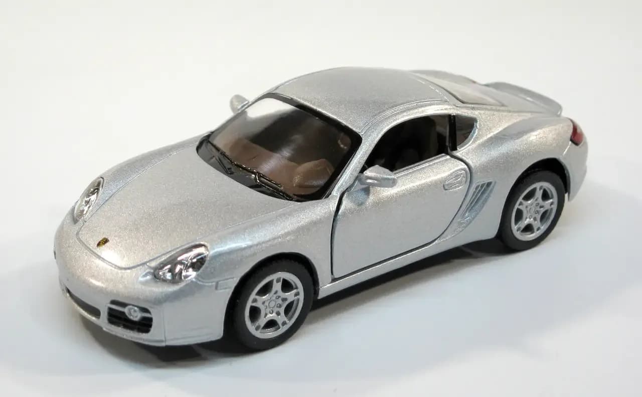 Машина Kinsmart Porsche Cayman S 1:34 KT5307W фото 6 Машина Kinsmart Porsche Cayman S 1:34 KT5307W фото 6